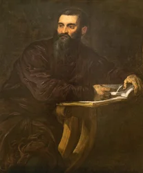 Retrato de un hombre barbudo con un libro